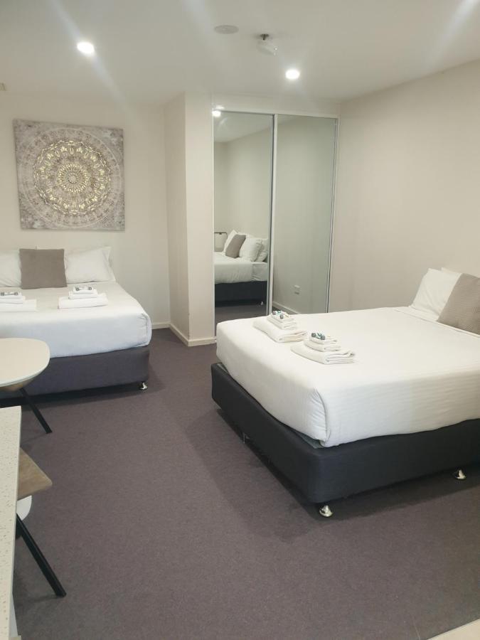 Carlton Suites Goulburn Zimmer foto